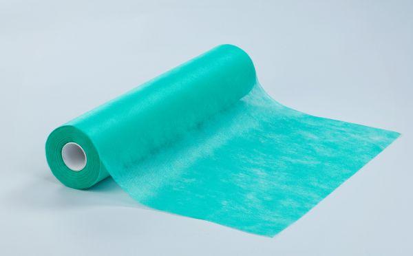 Medical couch roll of nonwoven Green